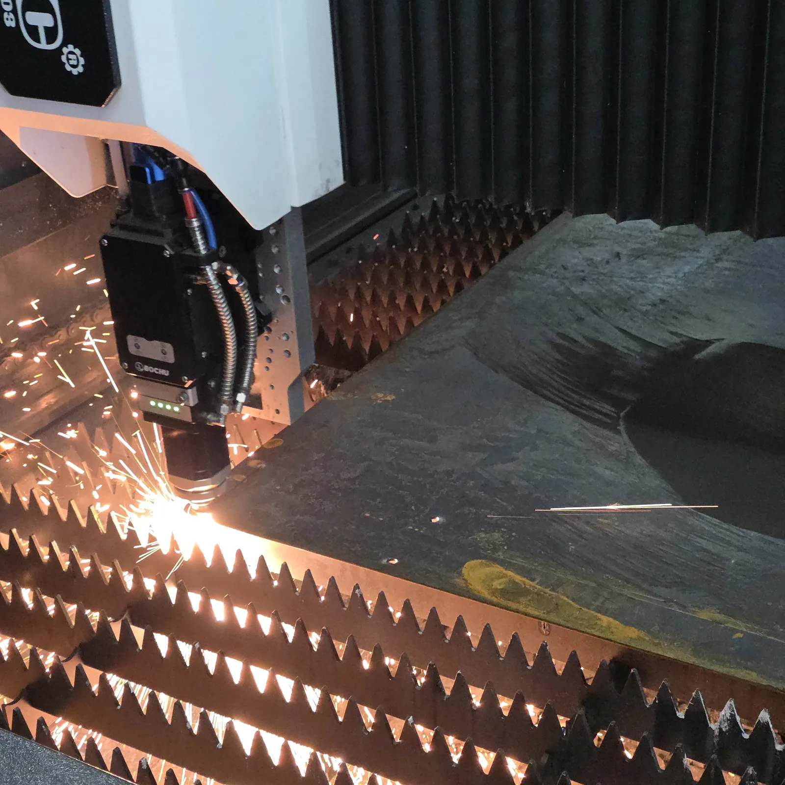 CNC fibre laser cutting steel plate